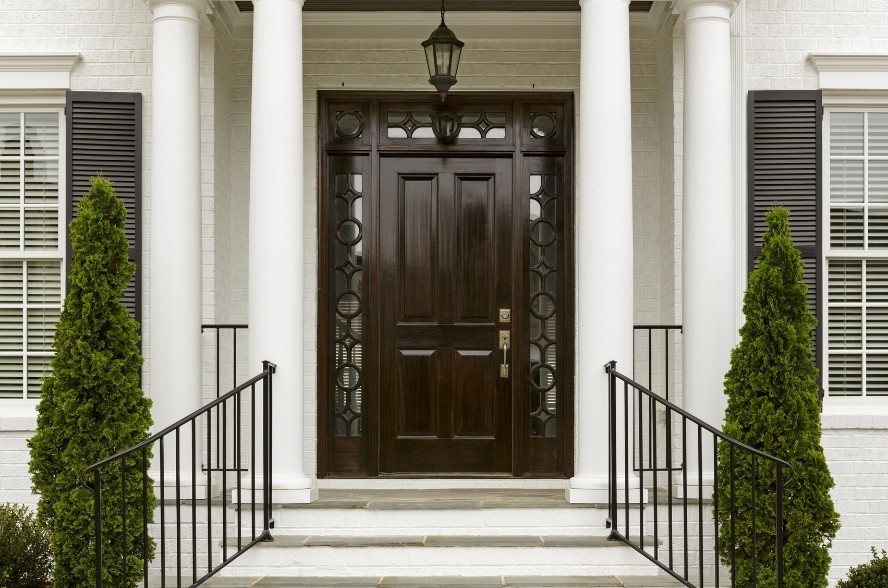 Image depicts the featured image for the blog article Fiberglass Vs. Steel Entry Doors: Which Should I Choose