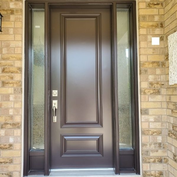 Image depicts a brown fiberglass entry door from a entry door replacement project in Milton.