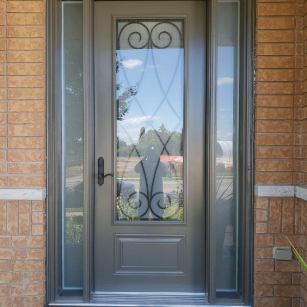New grey steel entry door in Brampton home.