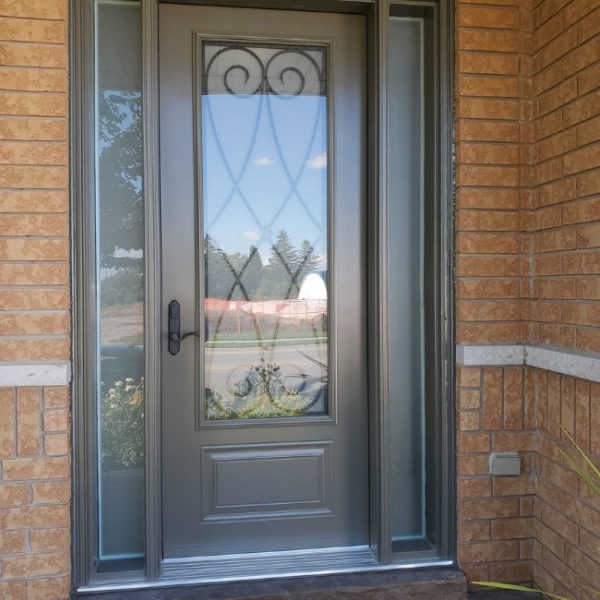 New grey steel entry door in Brampton home.