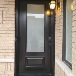 New black steel entry door in Richmond Hill.